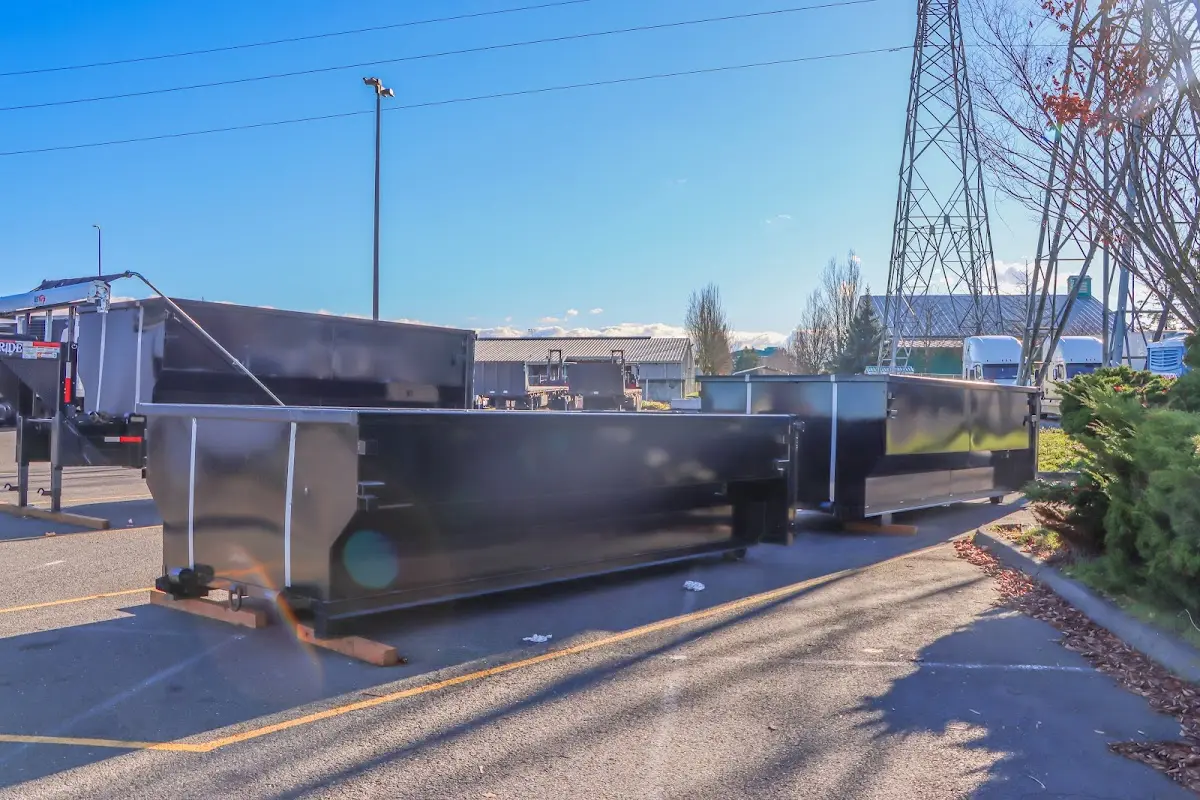 Roll-off dumpster ready for waste disposal at job site for 2 Yard Dumpster Rental in Harrison